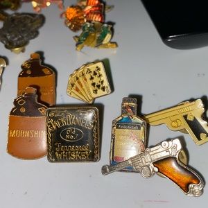 58 older Different Pins with backs. Splinter is the only pin with marks on back.